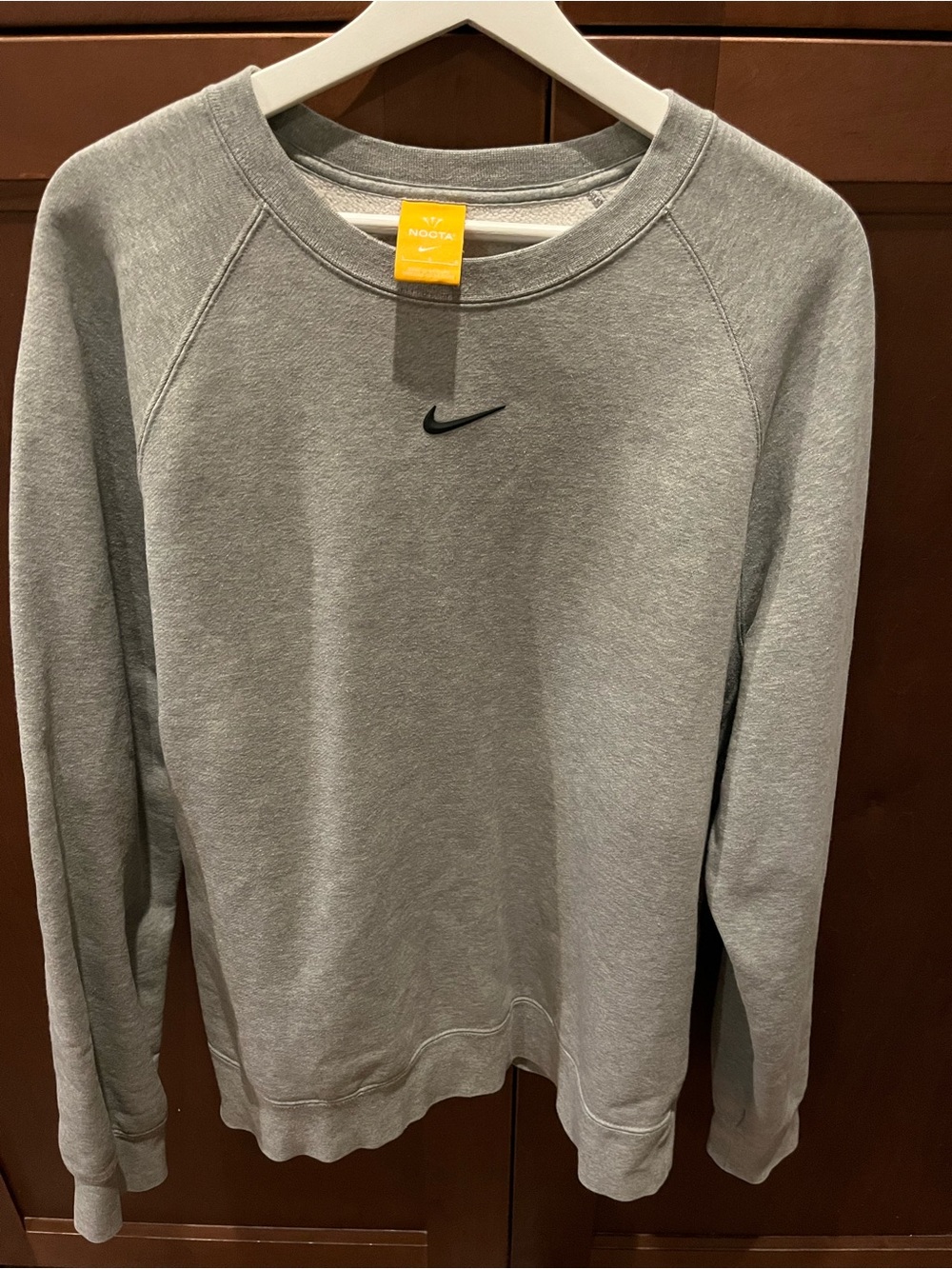 Nike NOCTA Gray Crewneck Sweatshirt with Black Swoosh